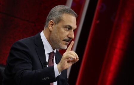 Turkey vows action against Kurdish militia amid Syrias political shift