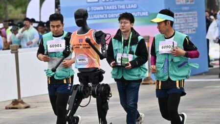 China hosts worlds first humanoid robot half marathon alongside human runners