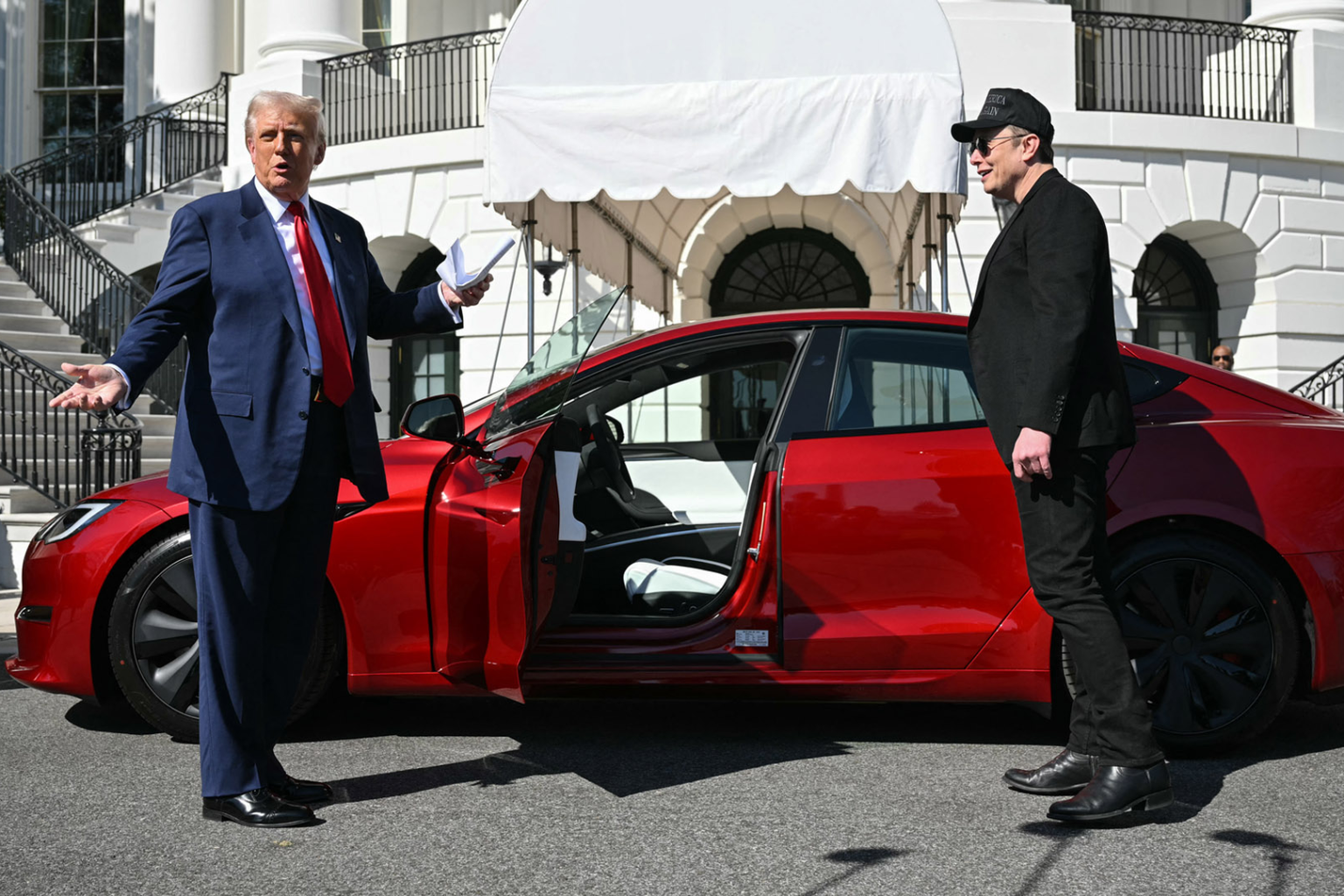 Musk to reduce Doge role after Tesla profits plunge