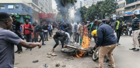 Motorbike gang disrupts peaceful anti-Lagat protest in Nairobi CBD as police watch Motorbike gang disrupts peaceful anti-Lagat protest in Nairobi CBD as police watch