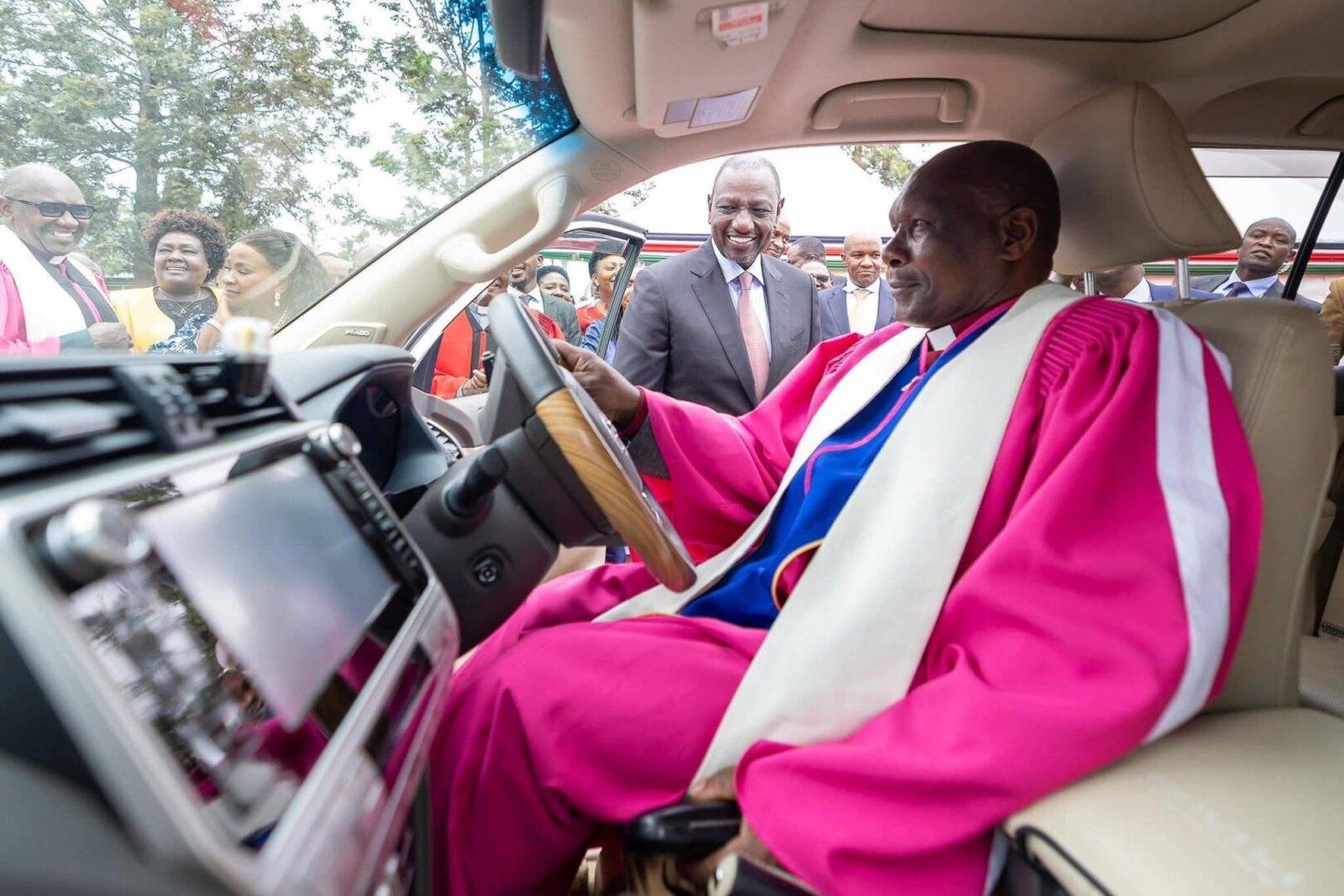 Ruto gifts AIC Bishop Benjamin Kalanzo a Toyota Prado