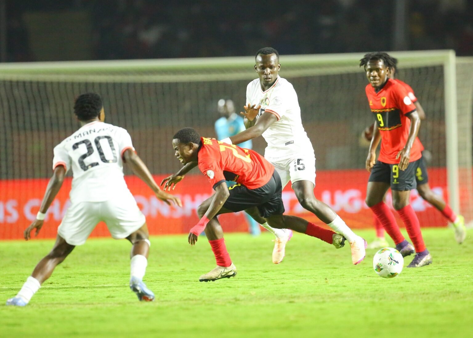 Ten-man Kenya battles to heroic 1-1 draw against Angola at CHAN to go top of Group A Ten man Kenya battles to heroic 1 1 draw against Angola at CHAN