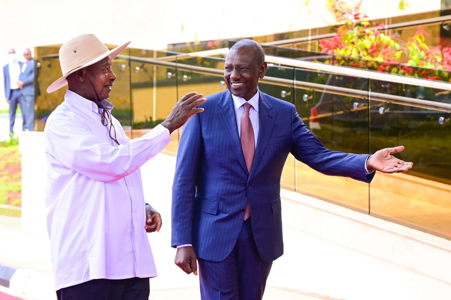 President Museveni shares a light moment with President William Ruto scaled