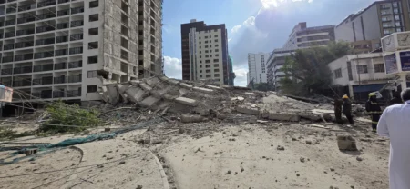 Two feared trapped after 14 storey building collapses in Nairobis South C scaled