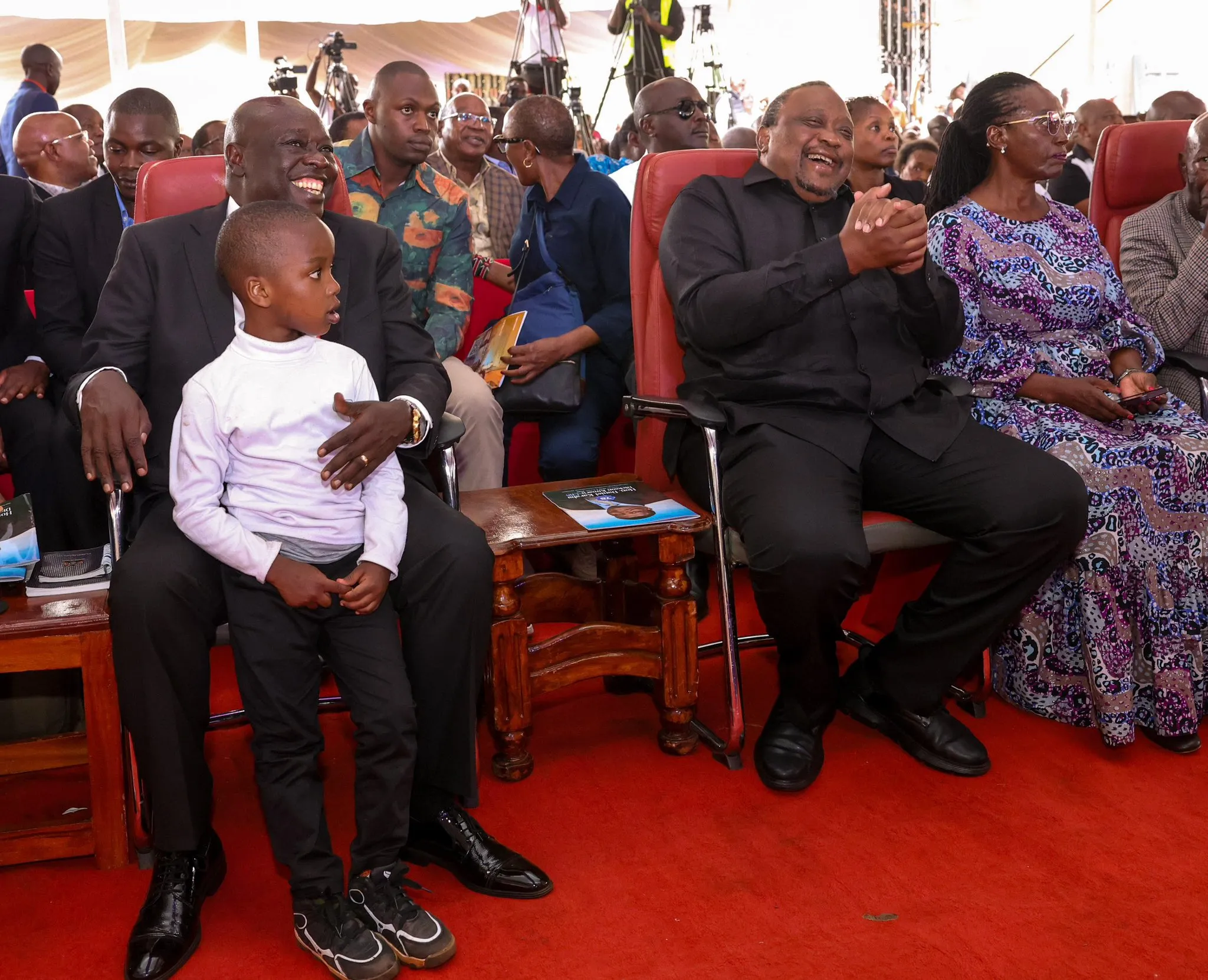 Uhuru Kenyatta and Gachagua share rare moment at Daniel Karaba burial
