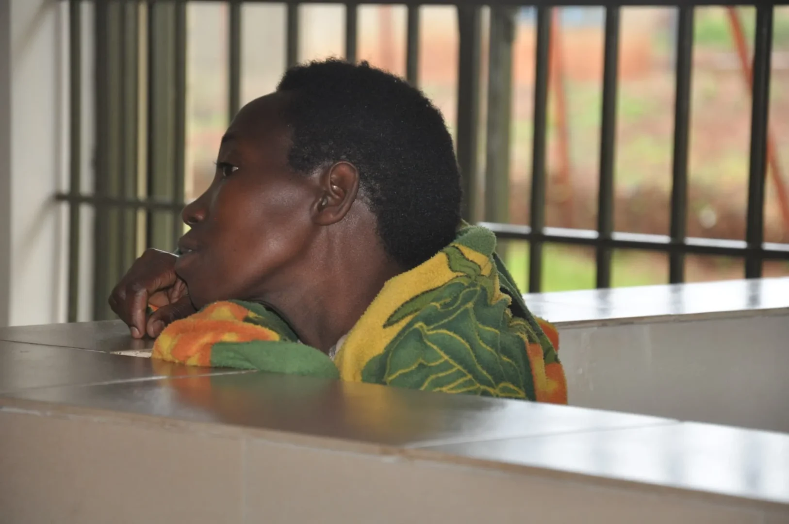 Ugandan woman accused of forcing stepson, 8, to swallow 46 needles appears in court