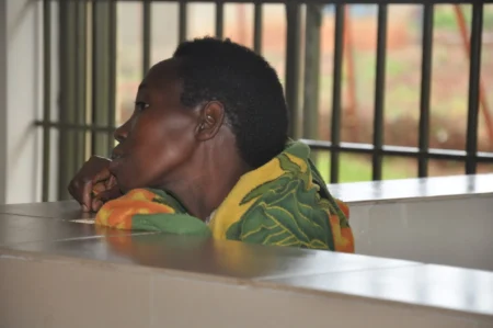 Ugandan woman accused of forcing stepson, 8, to swallow 46 needles appears in court