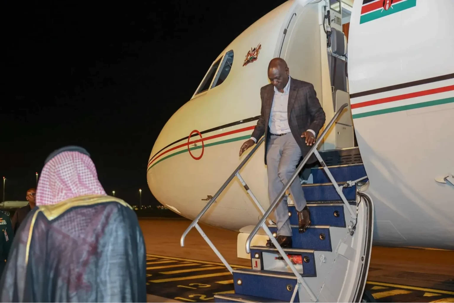 President William Ruto boarding a chartered executive jet during an international diplomatic visit