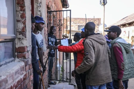 South Africa anti-migrant protests escalate as demonstrators go door-to-door South Africa anti-migrant protests escalate as demonstrators go door-to-door