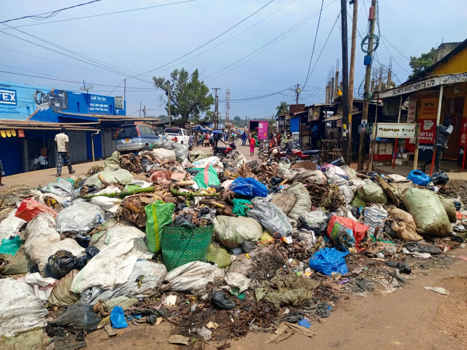 After Uganda's national cleanup, why was the garbage left behind?